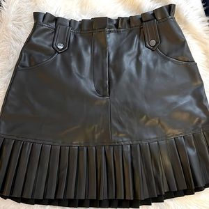 Black, faux leather skirt. Perfect for the season! Zara. Size M.